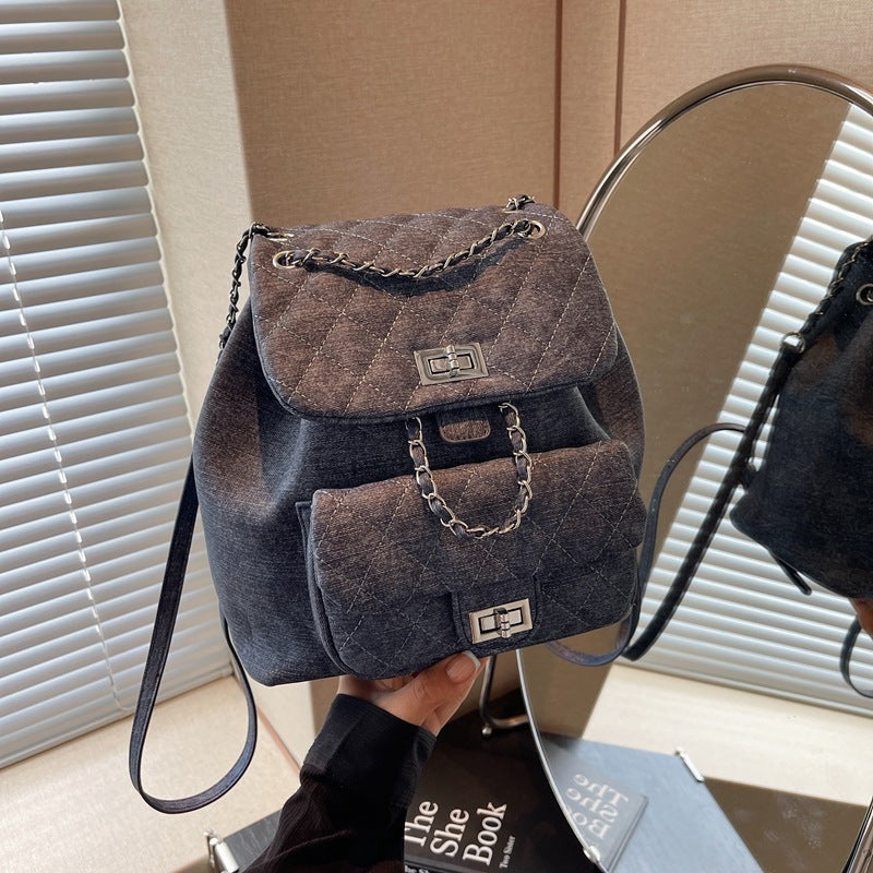 Sac à dos en denim avec chaîne, fermeture twist,