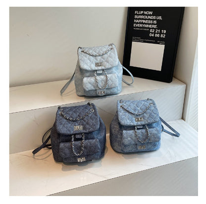 Sac à dos en denim avec chaîne, fermeture twist,