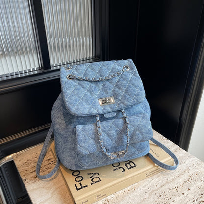 Sac à dos en denim avec chaîne, fermeture twist,